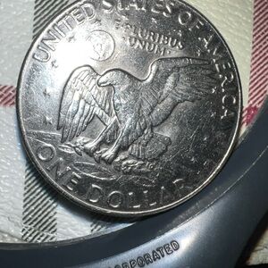 Eisenhower a one dollar  Liberty minted -D vintage 1977 featuring a flying eagle